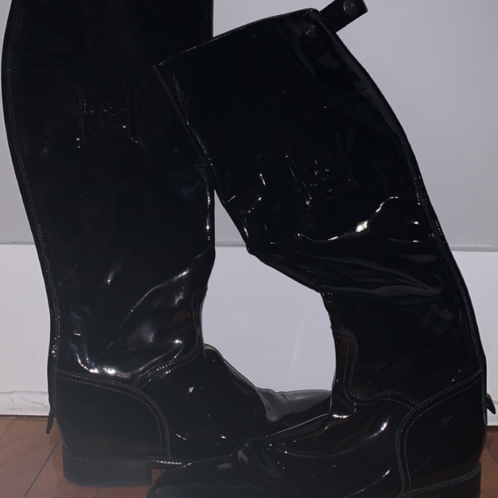 Used knee high Chanel boot.